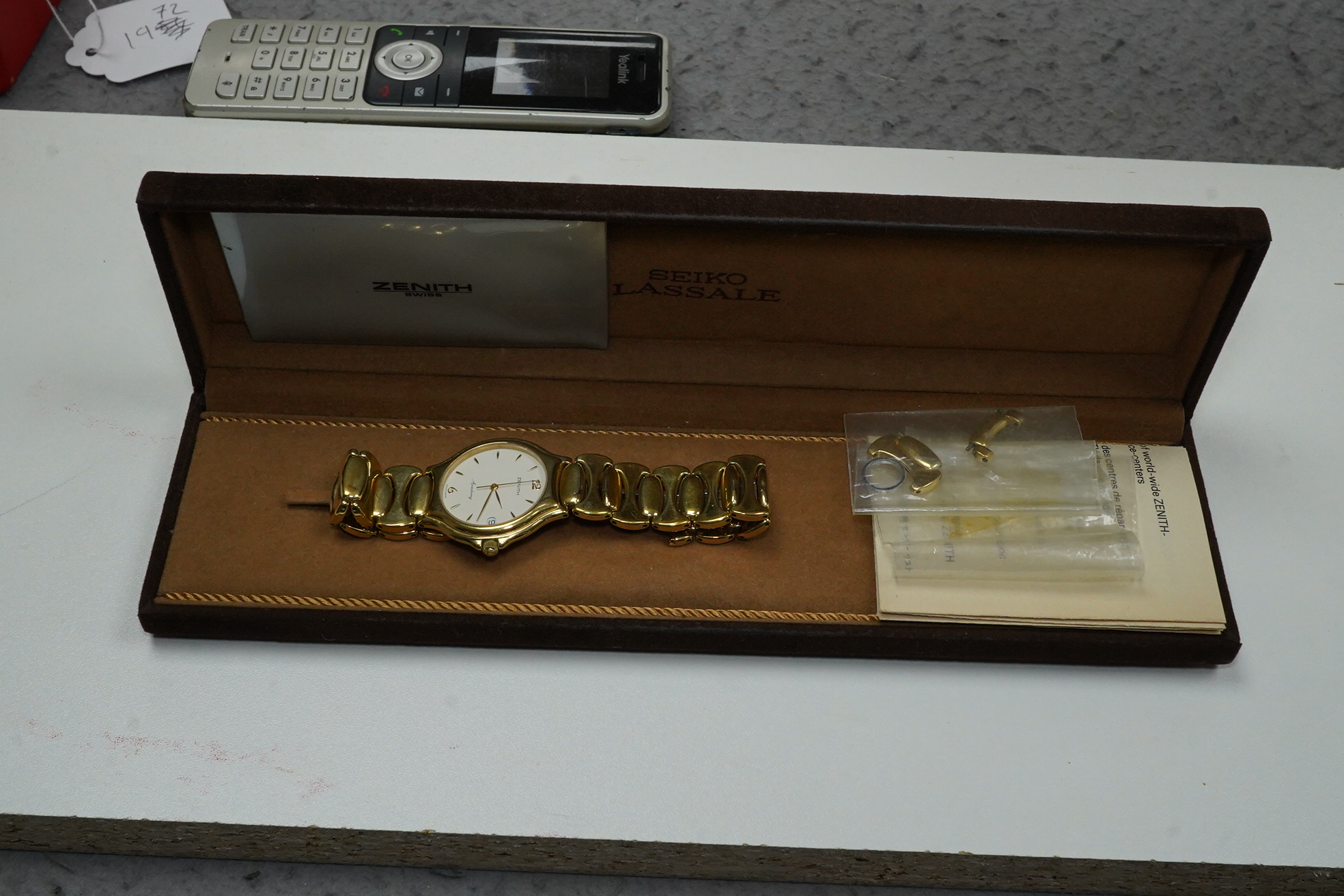 A gentleman's modern gold plated Zenith Academy quartz wrist watch. Condition - fair